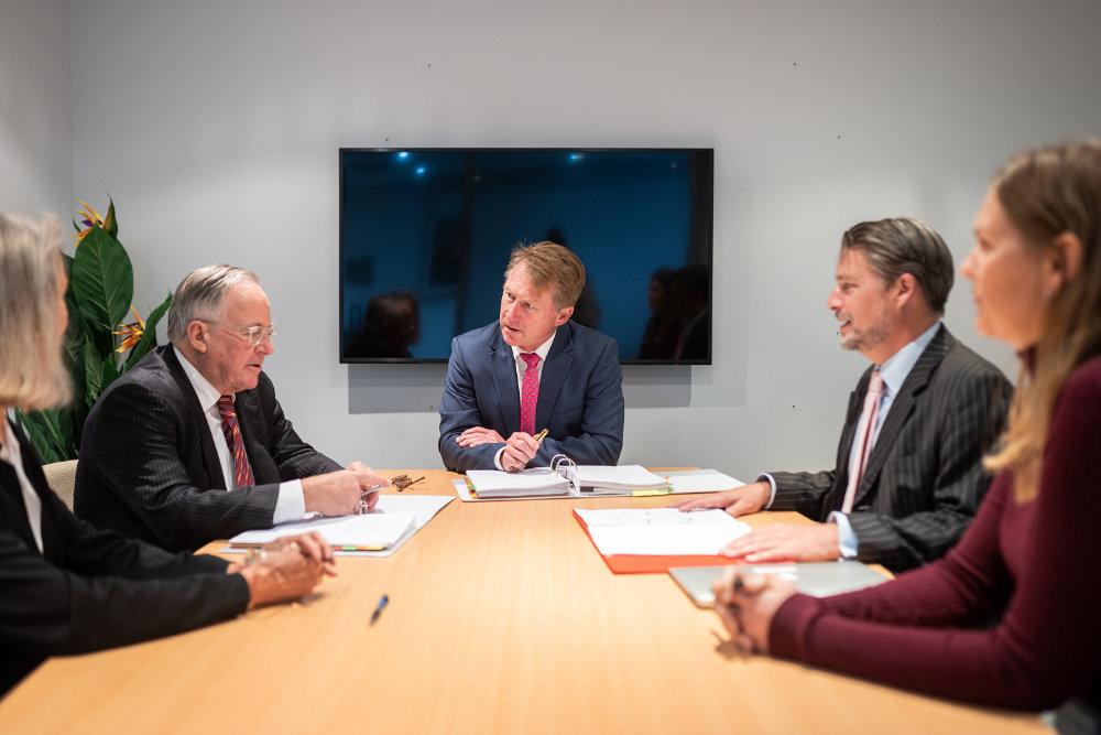 John in the boardroom